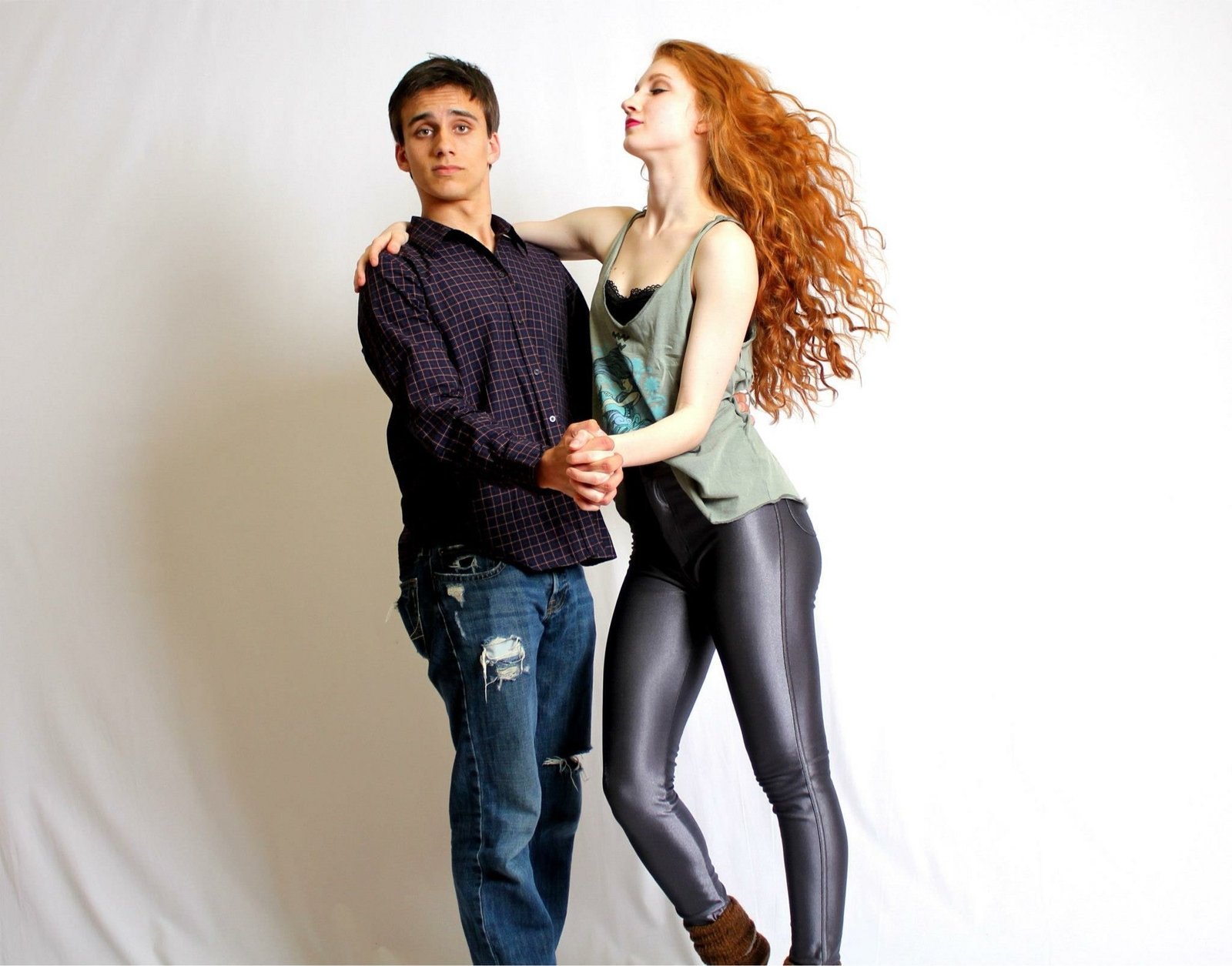 Studio dance partner shot, Melissa with flying red curls in a sage tank