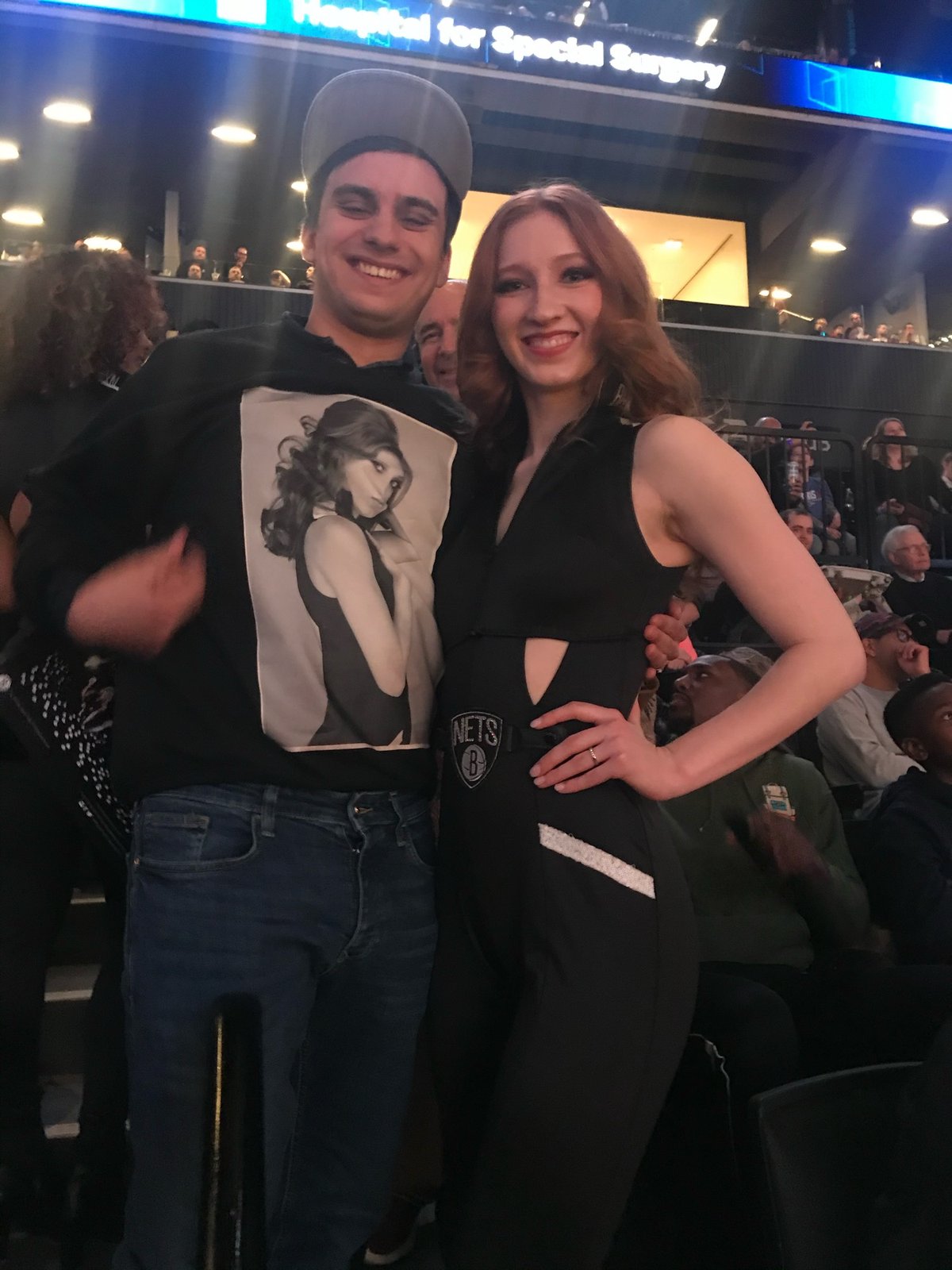 Posed with Luis in the Barclays Center stands during a Nets game