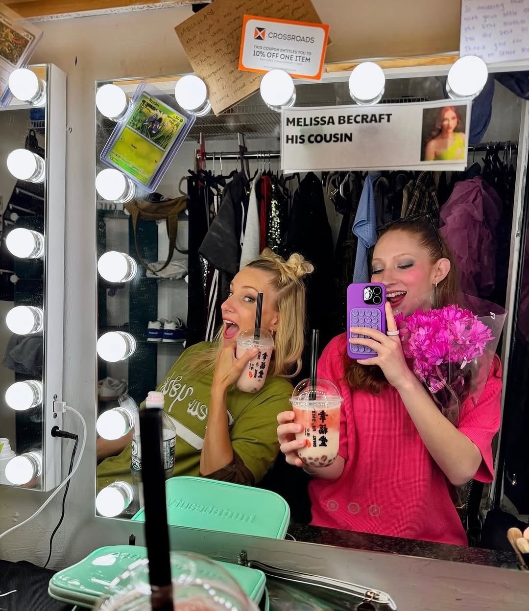 Backstage mirror selfie with a friend, dressing-room lights, MELISSA BECRAFT HIS COUSIN sign